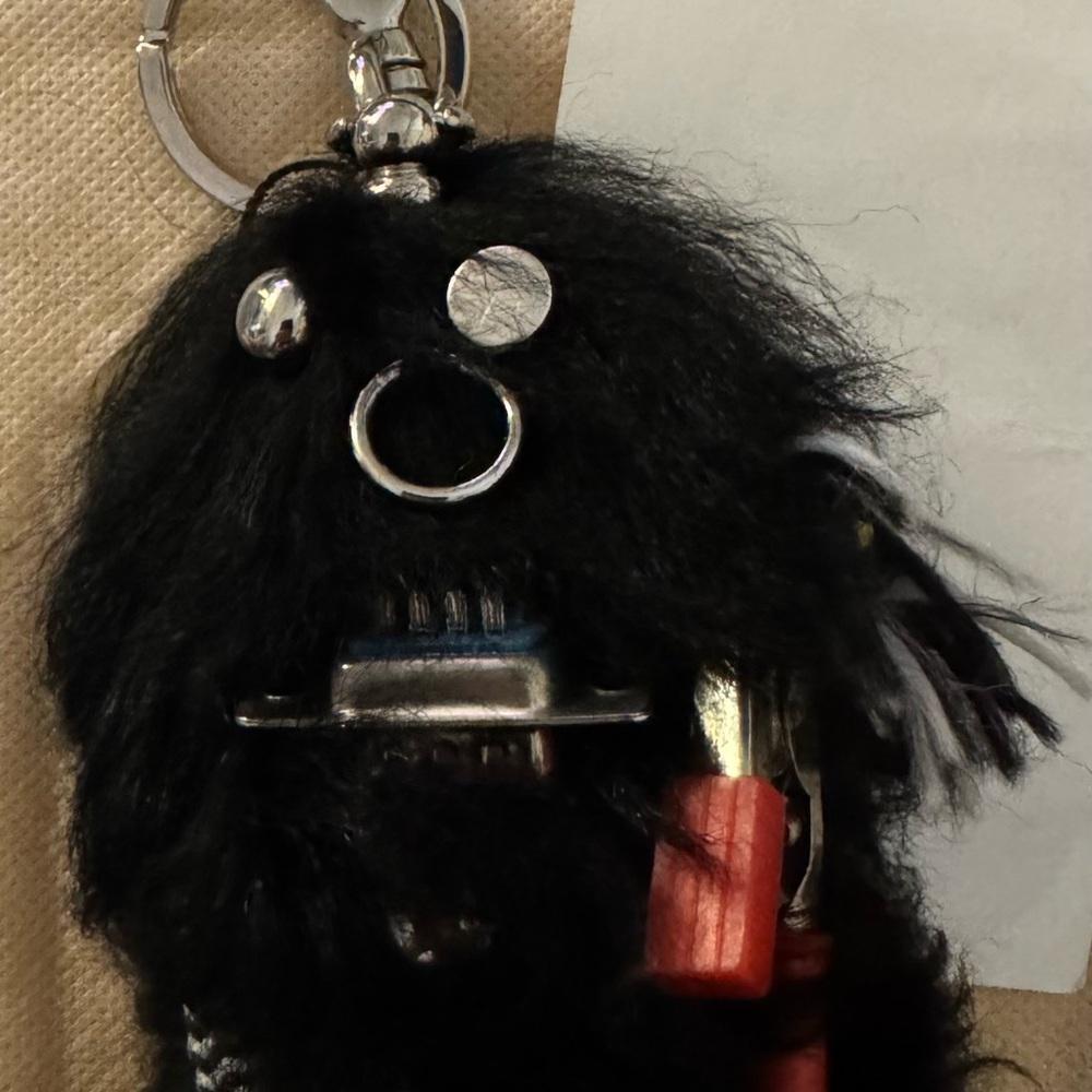 Prada Black & Red Fur Charm with Metallic Red Accents